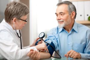 Man receiving blood pressure test