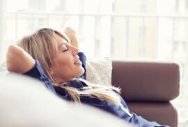 Woman On Couch Relaxing