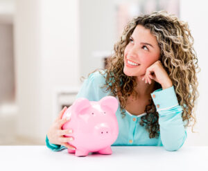 Woman with piggy bank