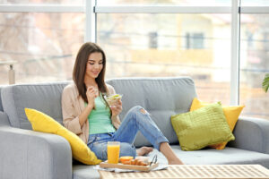 woman eating food to help dry eye